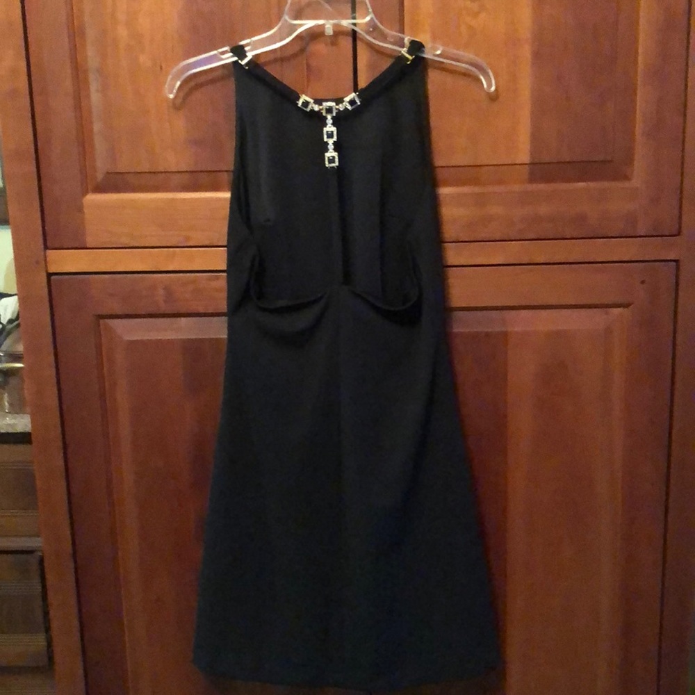 Black scrappy dress with bejeweled back detail